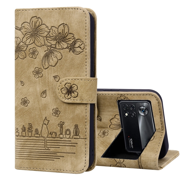 Brown embossed leather folio phone case with floral cat design, flip cover and stand
