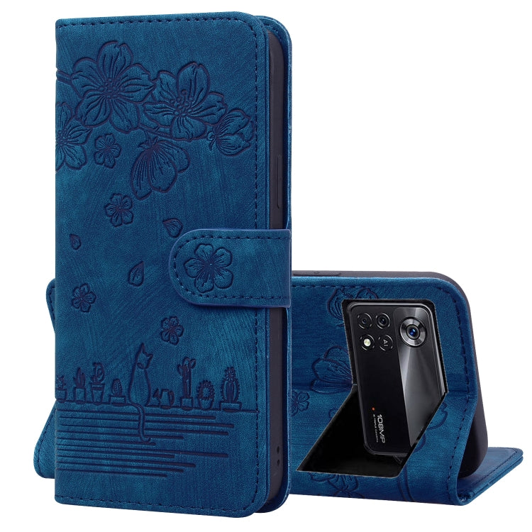 Royal blue folio phone case with embossed sakura cat pattern and flip cover, camera cutout