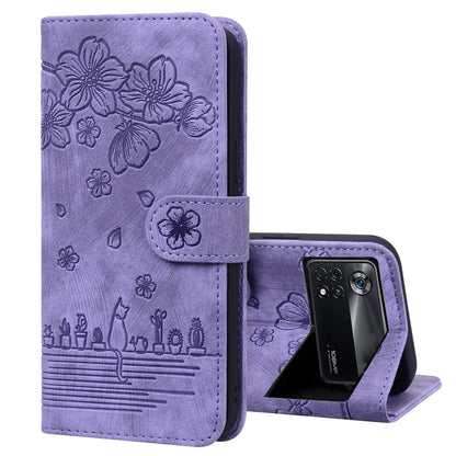 Lavender embossed floral flip phone case with strap closure and front cover