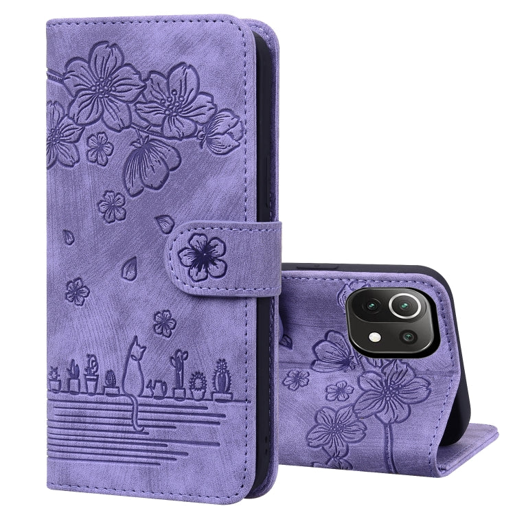 Lavender embossed floral flip phone case, stand folded, with camera cutout