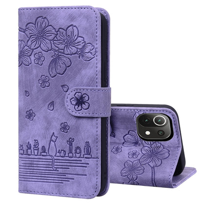 Lavender embossed floral flip phone case, stand folded, with camera cutout