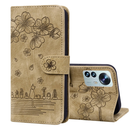 Brown embossed leather folio phone case with floral cat design, flip cover and stand