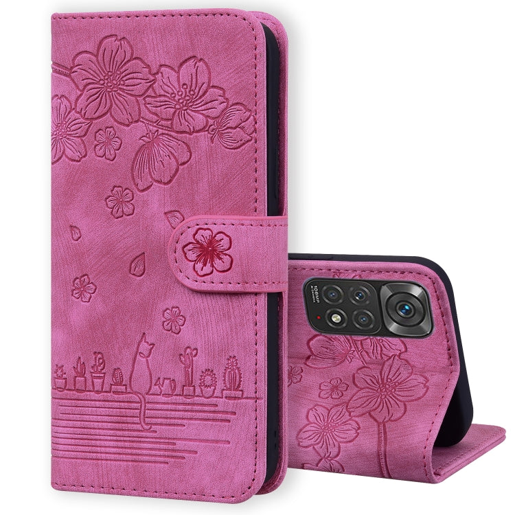 Embossed sakura cat leather folio phone case, rose-pink with phone attached