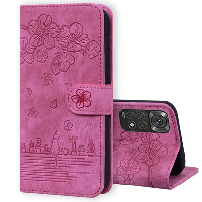 Embossed sakura cat leather folio phone case, rose-pink with phone attached