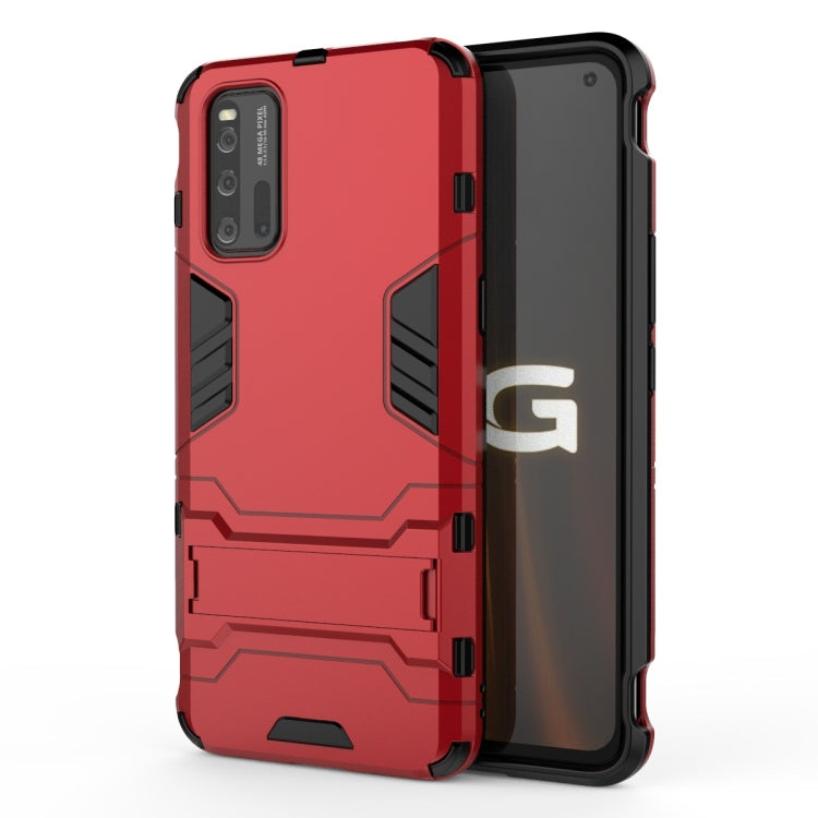 Shockproof phone case with red back and raised armor-style panel details
