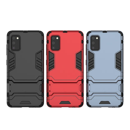 Rugged shockproof phone case in gray, red, and navy with raised corner protection