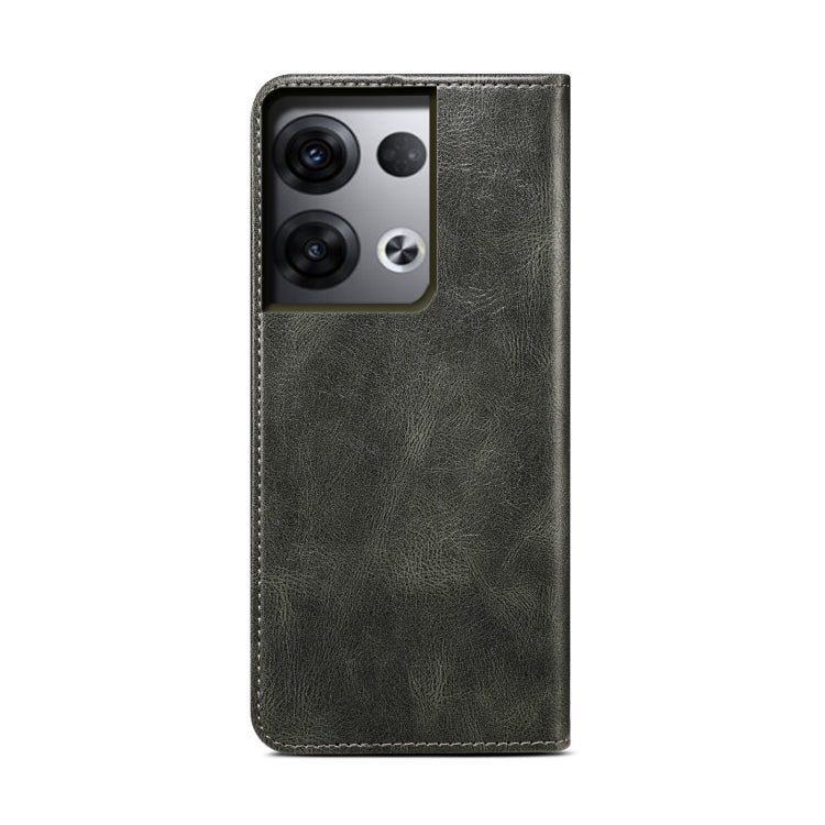 Dark green leather phone case with camera cutouts and smooth stitched border.