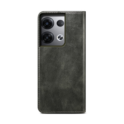 Dark green leather phone case with camera cutouts and smooth stitched border.
