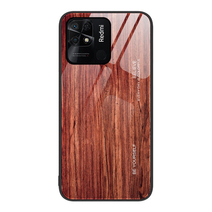 Wood-grain glass phone case with reddish brown wood texture and camera cutouts