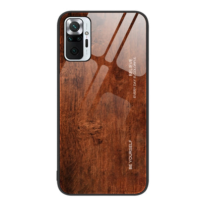 Wood-grain protective phone case in dark brown with camera cutouts.