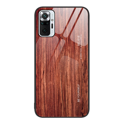 Wood-grain phone protective case with cutouts for camera and flash, reddish-brown finish.