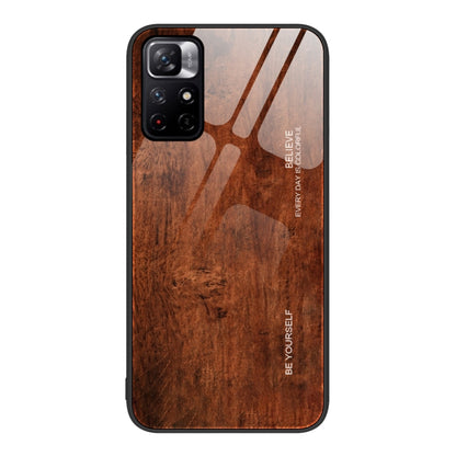 Wood-grain protective phone case in deep brown with camera cutouts.