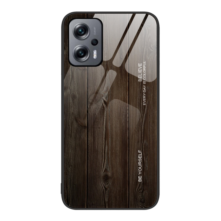 Wood-grain phone protective case with camera and flash cutouts, dark brown wood texture.
