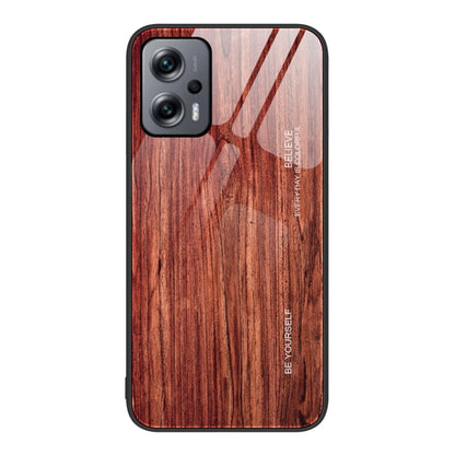 Dark brown wood-grain glass phone case with camera cutouts and raised edges