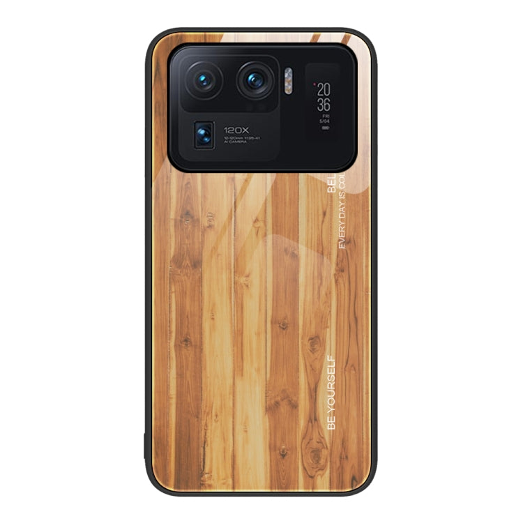 Wood grain glass phone case with pale golden tan wood pattern and black edges