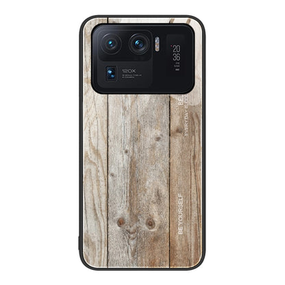 Wood grain glass phone case with light beige wooden boards and black edges