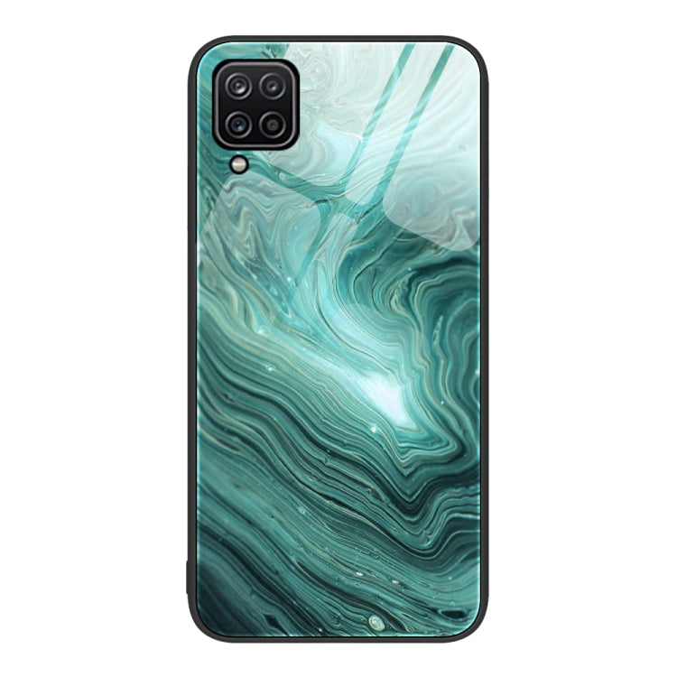 Glass protective phone case with teal green marble swirl pattern