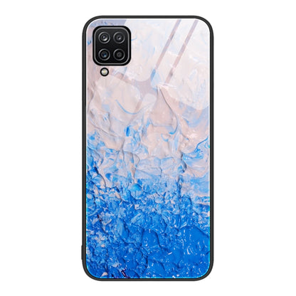 Glass protective phone case with light blue to dark blue ocean marble crackle pattern