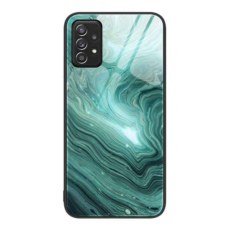 Glass protective phone case with teal green layered marble swirl pattern