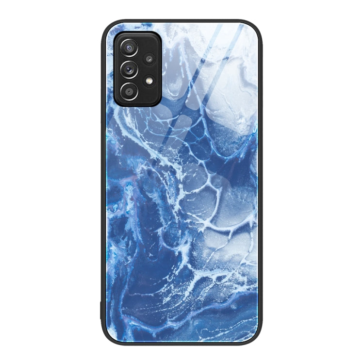 Blue marble-pattern protective phone case with camera cutout and raised edges