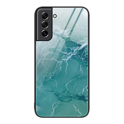 Marble glass protective phone case with teal marble network pattern and camera cutouts