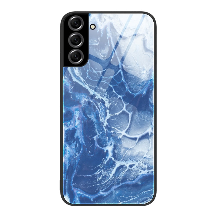 Protective phone case with blue marble veining and white crackle pattern and black frame