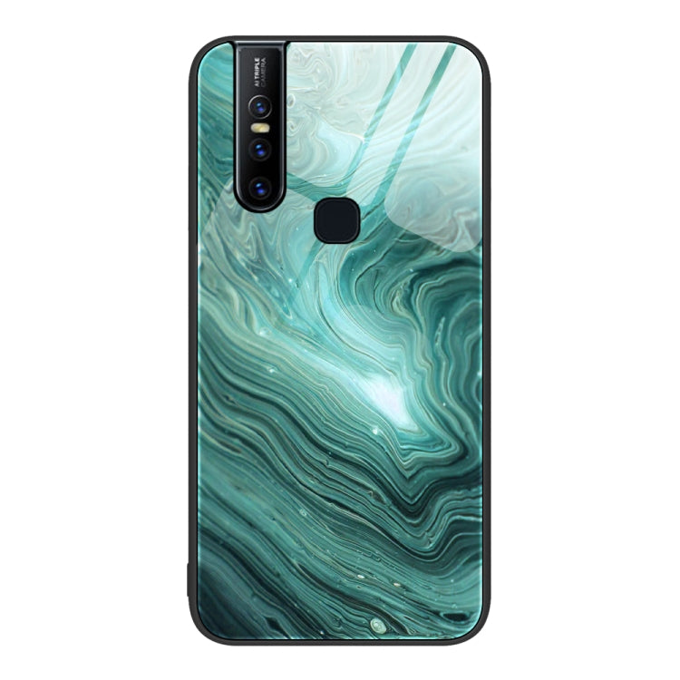 Protective phone case with teal green marble wave pattern and camera cutout
