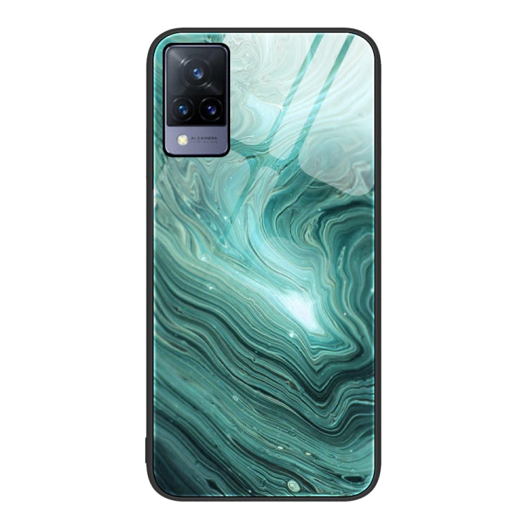 Protective phone case with teal ocean marble wave pattern and camera cutout