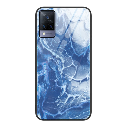 Protective phone case with icy blue marble splash pattern and camera cutout