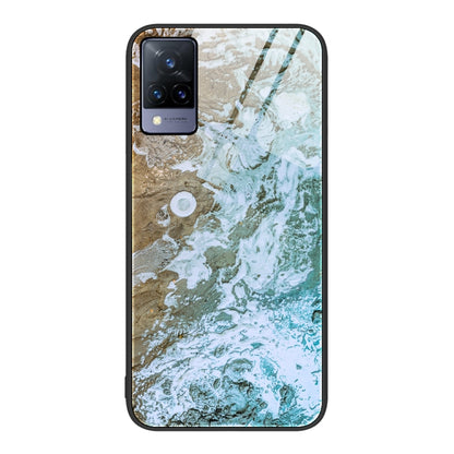 Glass protective phone case with beige, green, and white marbled pattern and camera cutouts