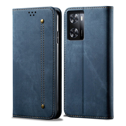 Blue denim-textured flip phone case with gold stitching and camera cutout.