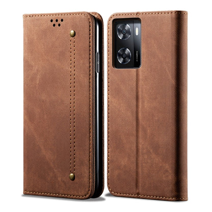 Brown denim-textured flip phone case with gold stitching and camera cutout.