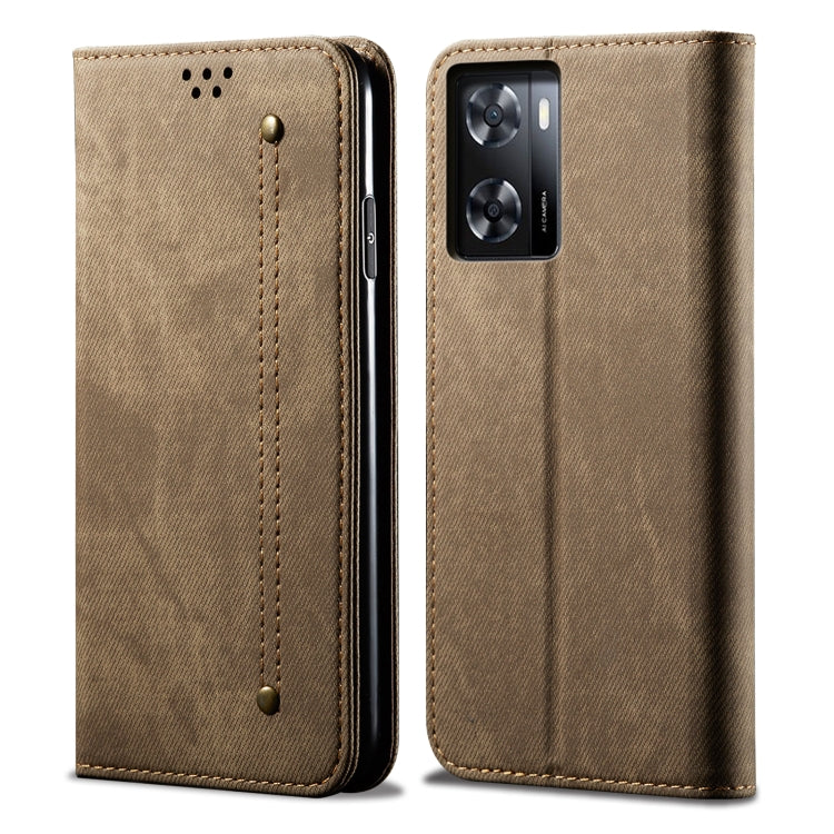 Khaki denim-textured flip phone case with gold stitching and camera cutout.