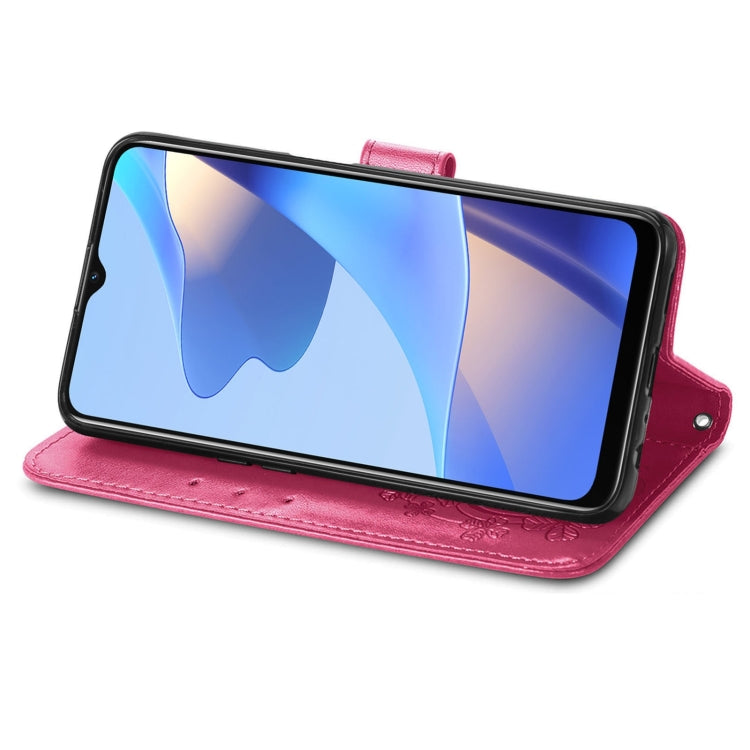 Rose red leather folio phone case with embossed four-leaf clasp and viewing stand