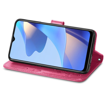 Rose red leather folio phone case with embossed four-leaf clasp and viewing stand