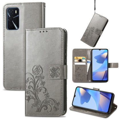 Grey leather folio phone case with embossed four-leaf clasp and card holder