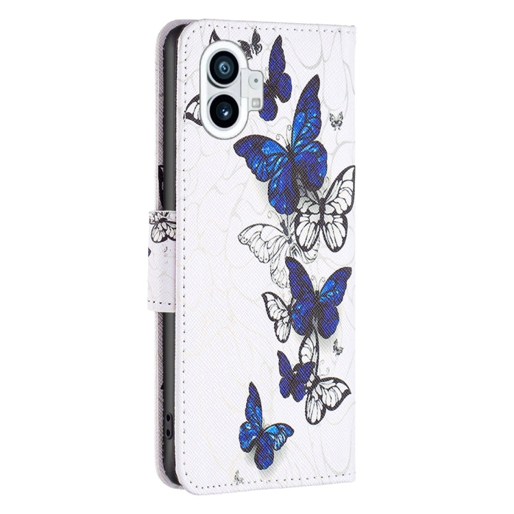 White leather wallet phone case with blue butterflies and black botanical line artwork