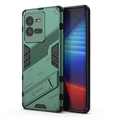 Green shockproof phone case with textured armor panels and raised camera cutouts