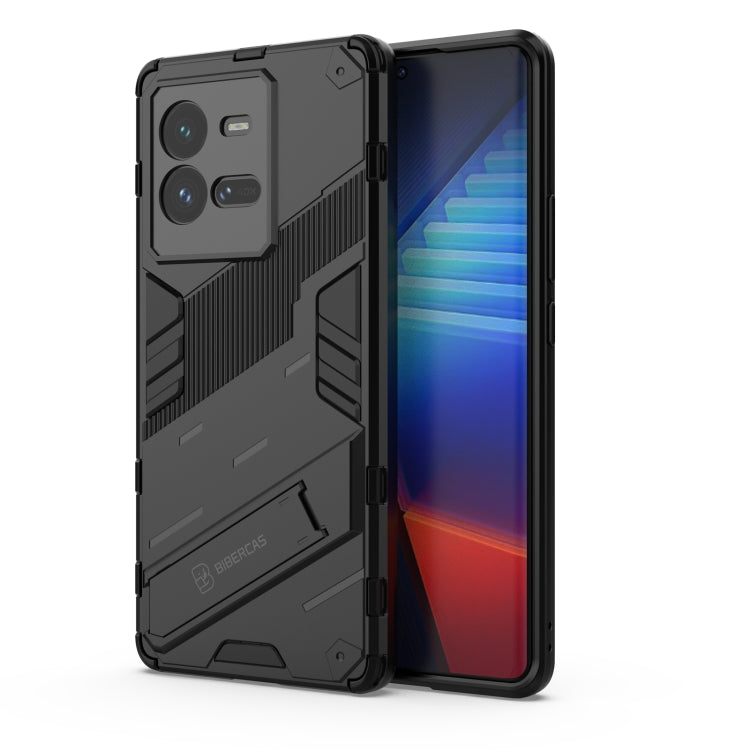 Black shockproof phone case with rugged armor texture and raised camera cutouts