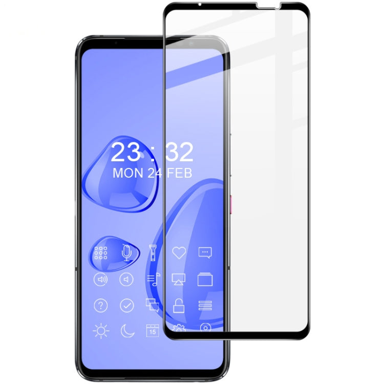 Full-coverage tempered glass screen protector film on a blue smartphone display