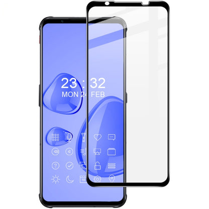 Full-coverage tempered glass screen protector film on a smartphone with blue UI