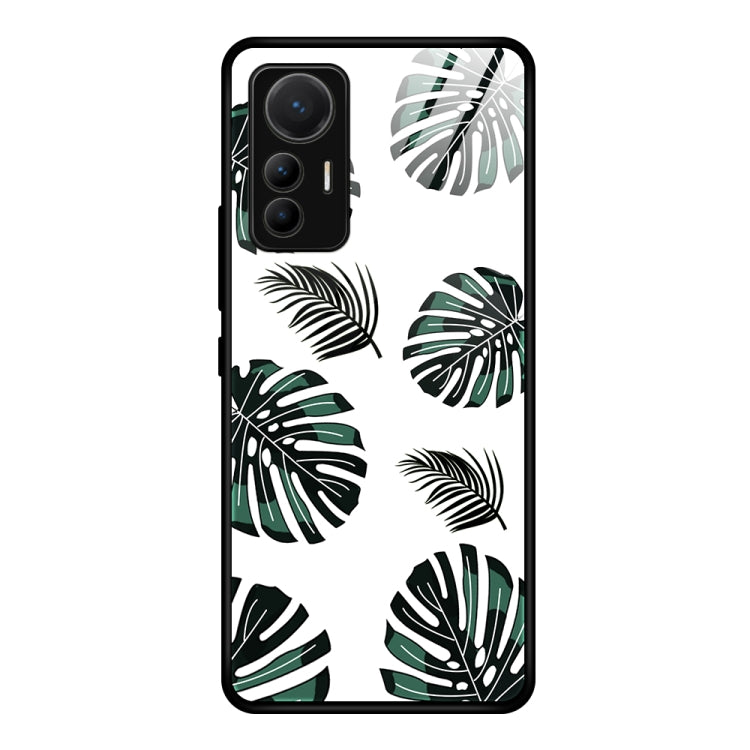 Black-edged glass phone case with green leaf pattern