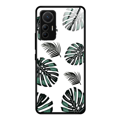 Black-edged glass phone case with green leaf pattern