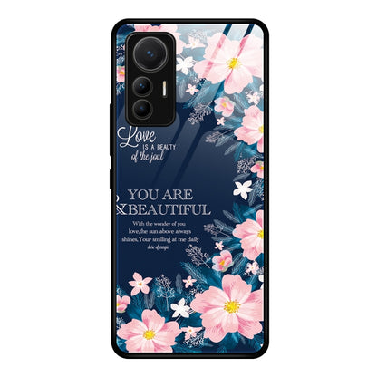 Glass phone case with pink floral garden design