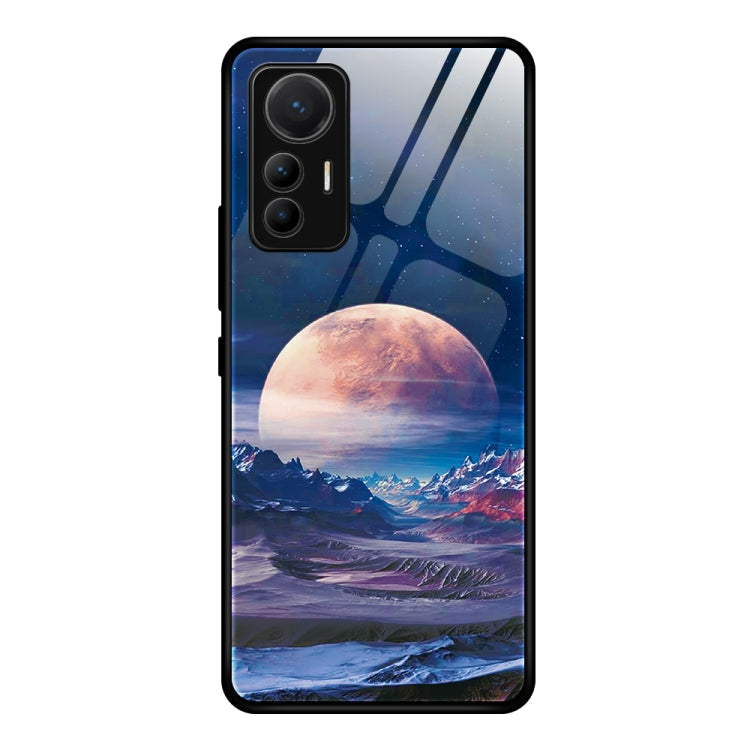 Tempered glass phone case with blue planet and mountain landscape