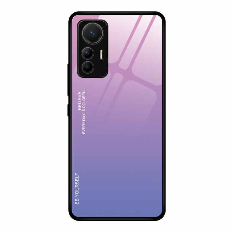 Gradient glass phone case with pink-to-purple finish and cutouts for triple cameras