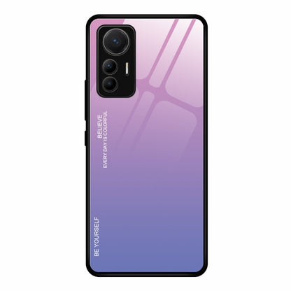 Gradient glass phone case with pink-to-purple finish and cutouts for triple cameras