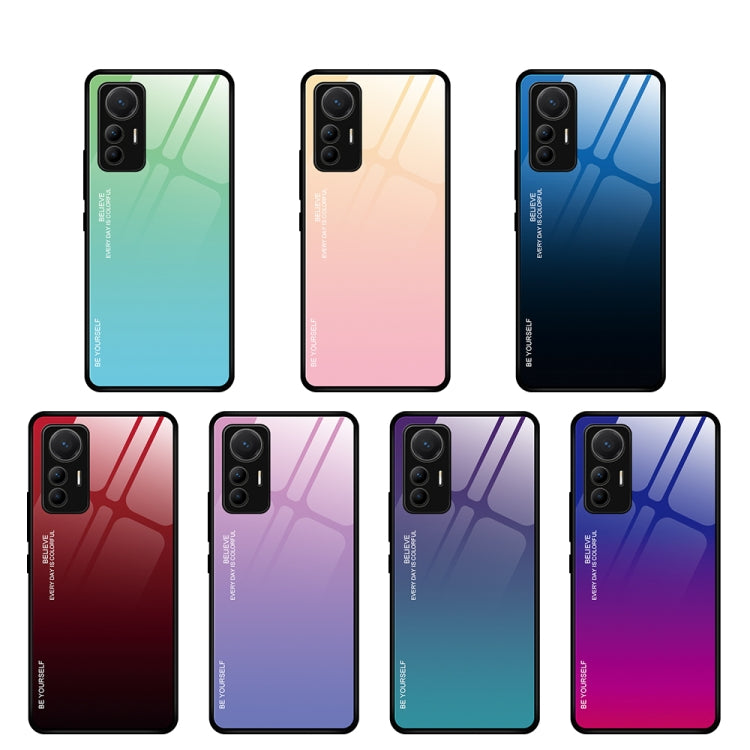 Multiple gradient glass phone cases showing different color finishes and triple-camera cutouts