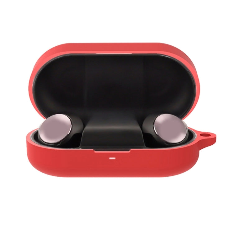 Red silicone Bluetooth earphone case, open with earbuds visible