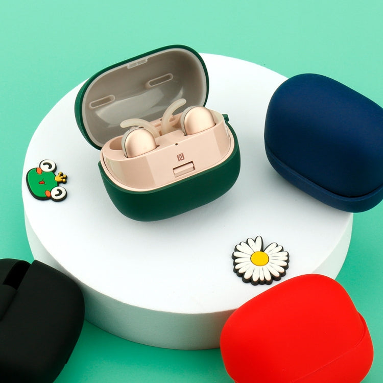 Green silicone earphone protective case, open showing earbuds in cradle